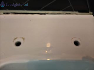 Loodgieter Hangend toilet plaatsen Hangende wc pot komt los van de muur