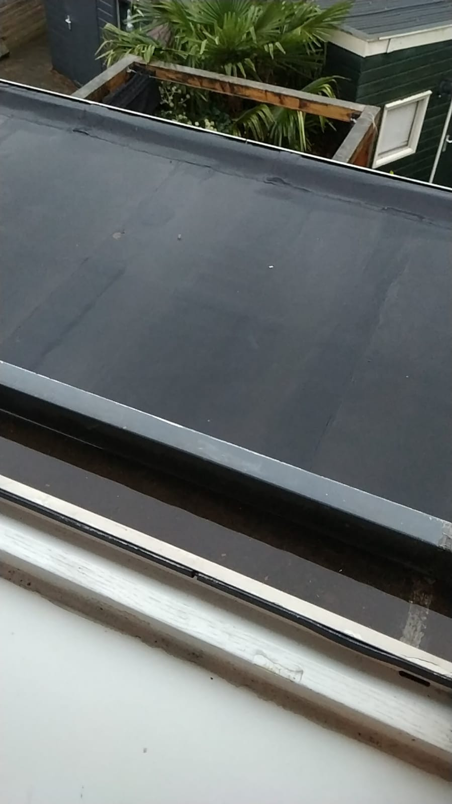 Nieuwe zinken dakgoot